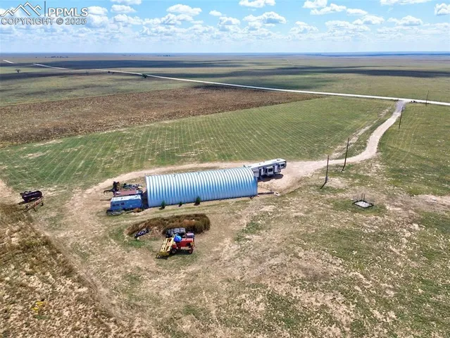 a view of a garage with parked cars