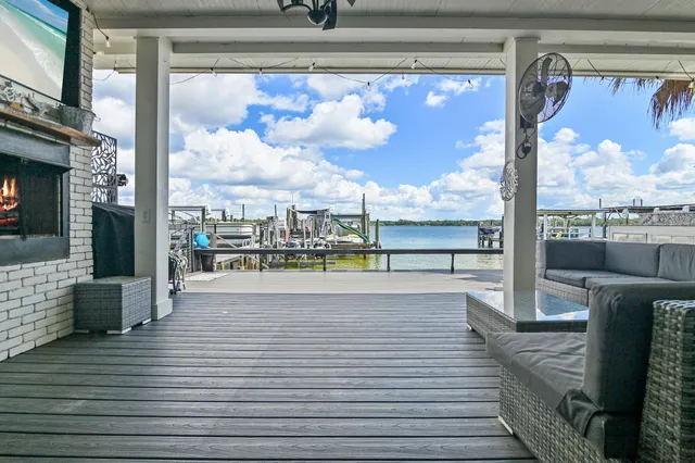 a view of a lake with boats and trees