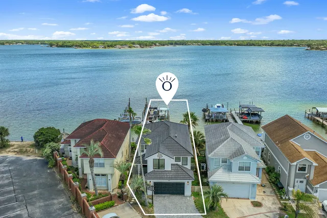 a front view of a house with a garage