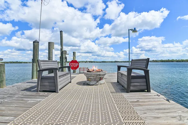 a bedroom with a bed and a table