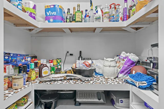 a bathroom with a sink a mirror and a toilet