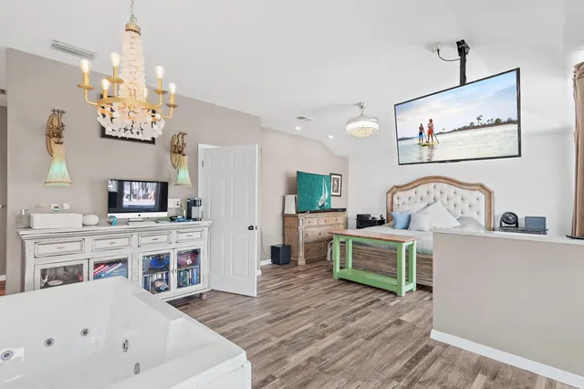 an aerial view of a house with a ocean view