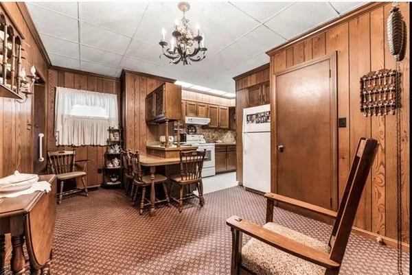 a kitchen with a stove and a sink