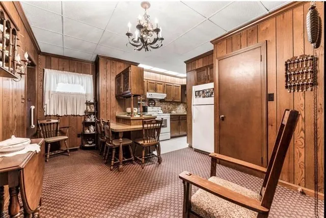 a kitchen with a stove and a sink