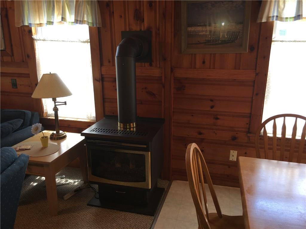 1277 Post Road, Unit 153 Wells, ME 04090 - Photo 10 of 17 Propane stove for those chilly evenings