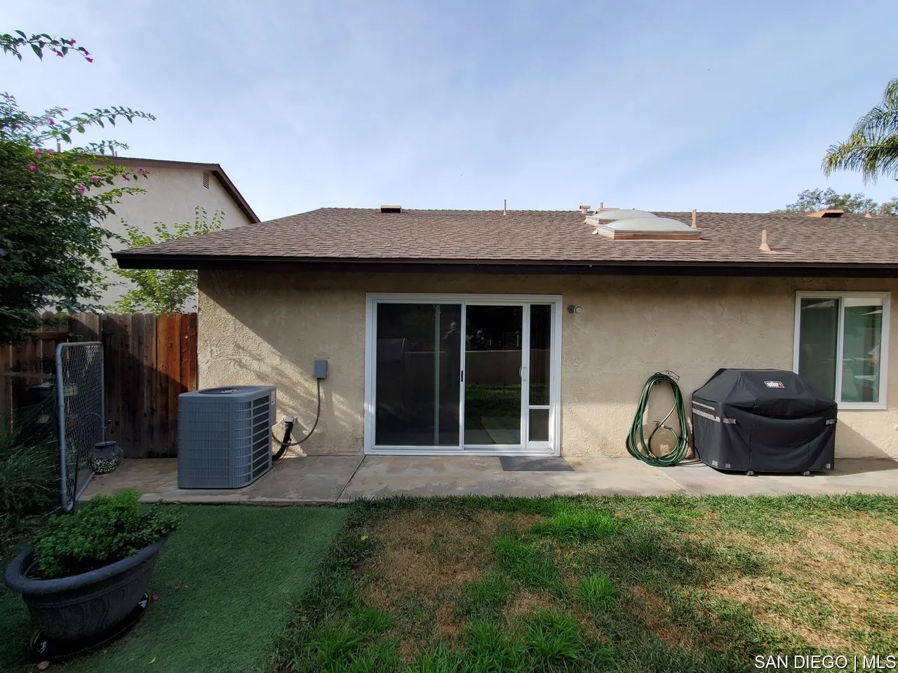 5984 Palencia Drive Riverside, CA 92509 - Photo 12 of 16 a front view of a house with garden