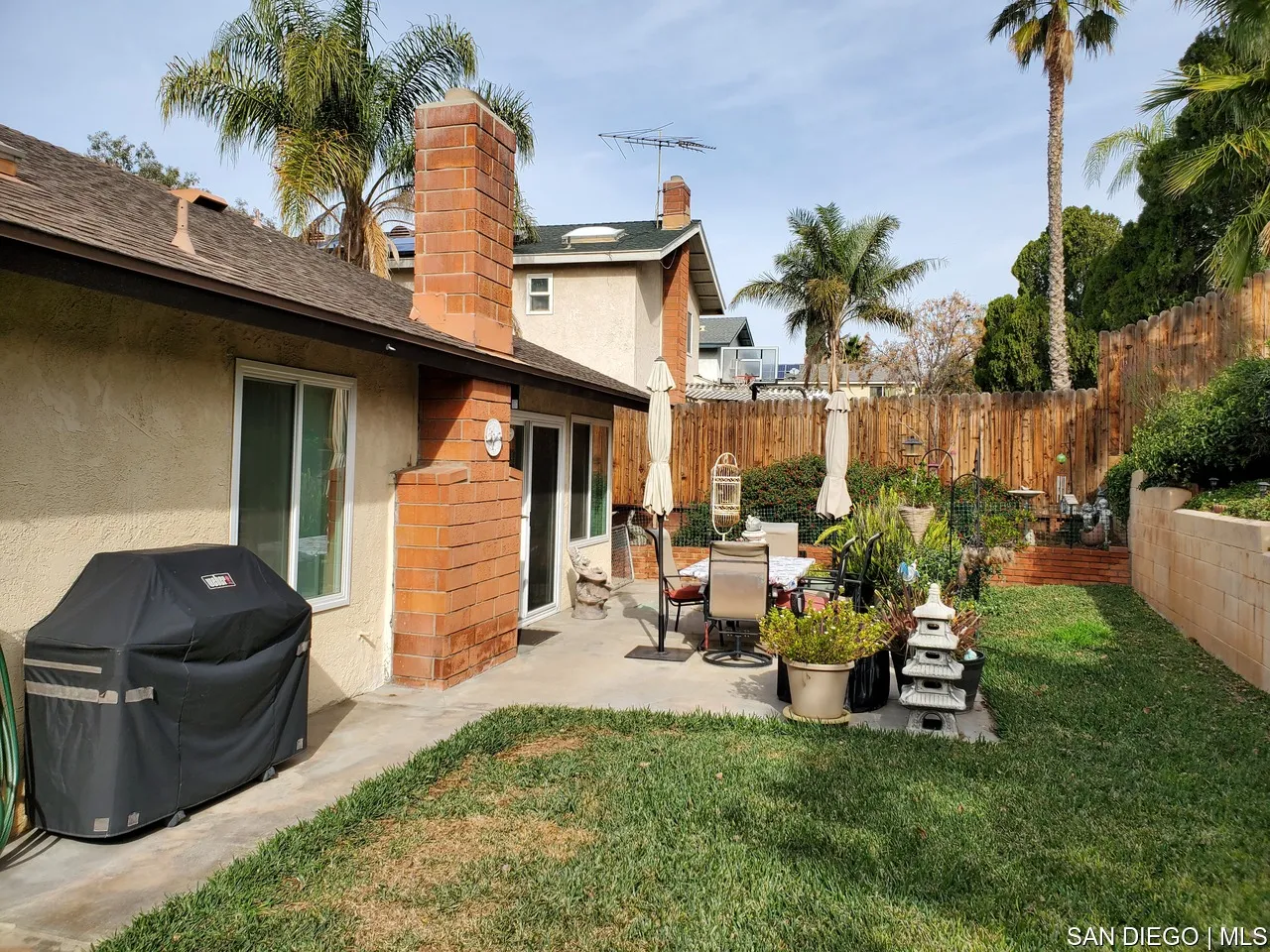 5984 Palencia Drive Riverside, CA 92509 - Photo 14 of 16 a view of a chair and table in backyard of the house
