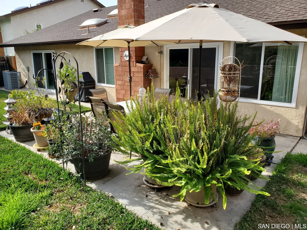 5984 Palencia Drive Riverside, CA 92509 - Photo 8 of 16 front view of a house with a yard