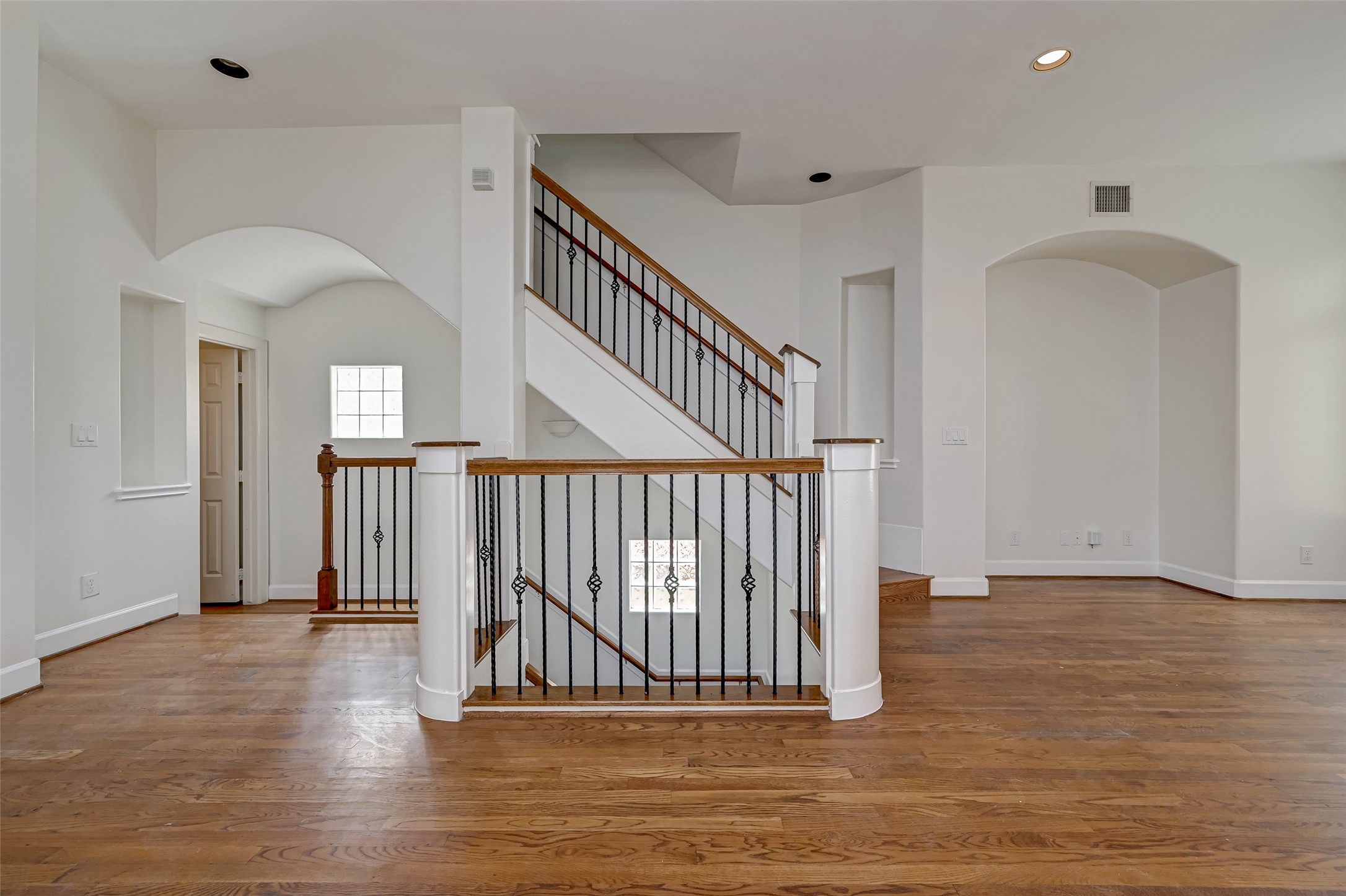 5410 Rose Street Houston, TX 77007 - Photo 16 of 41 a view of entryway with wooden floor