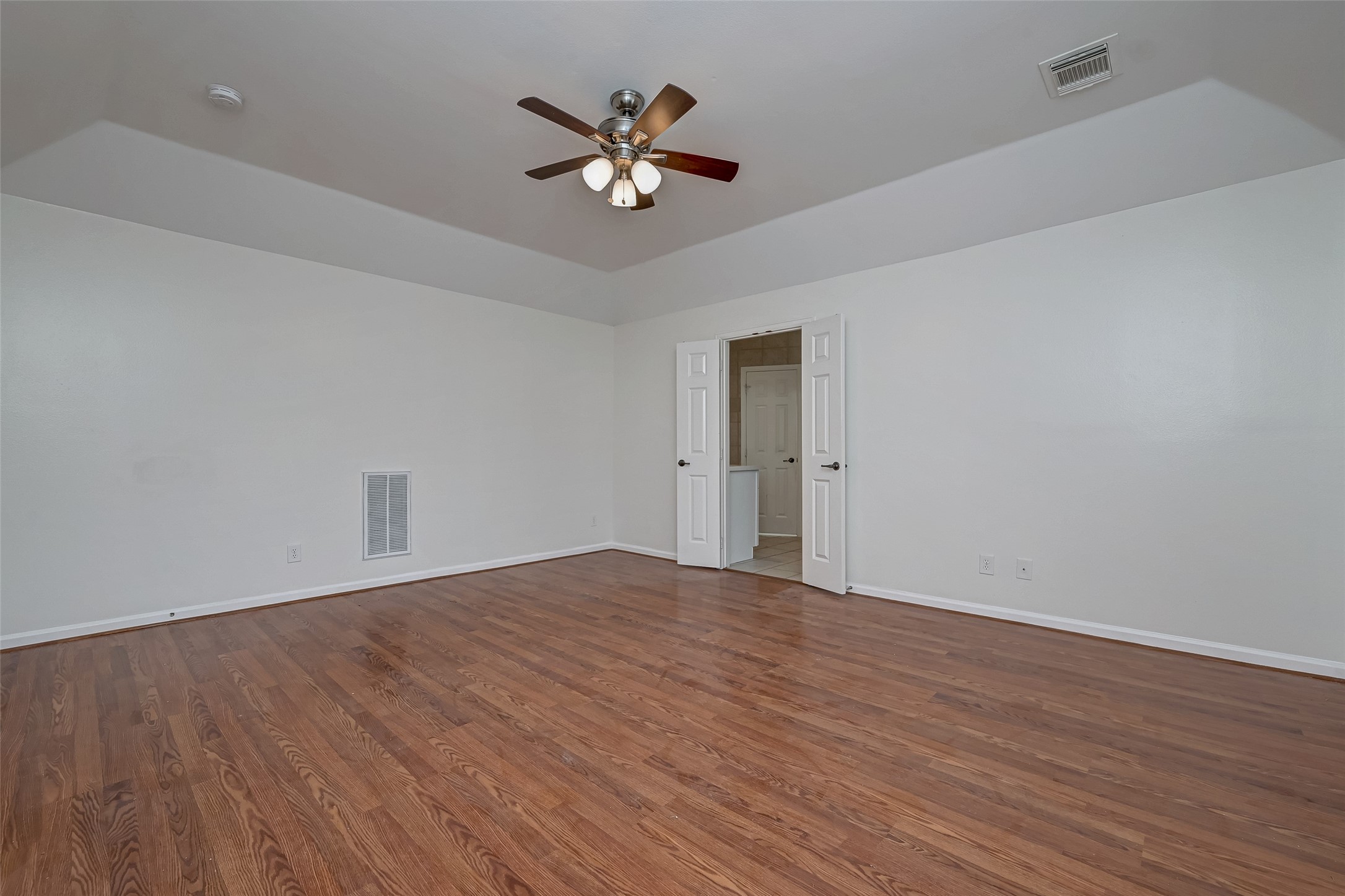 5410 Rose Street Houston, TX 77007 - Photo 29 of 41 a view of an empty room with wooden floor