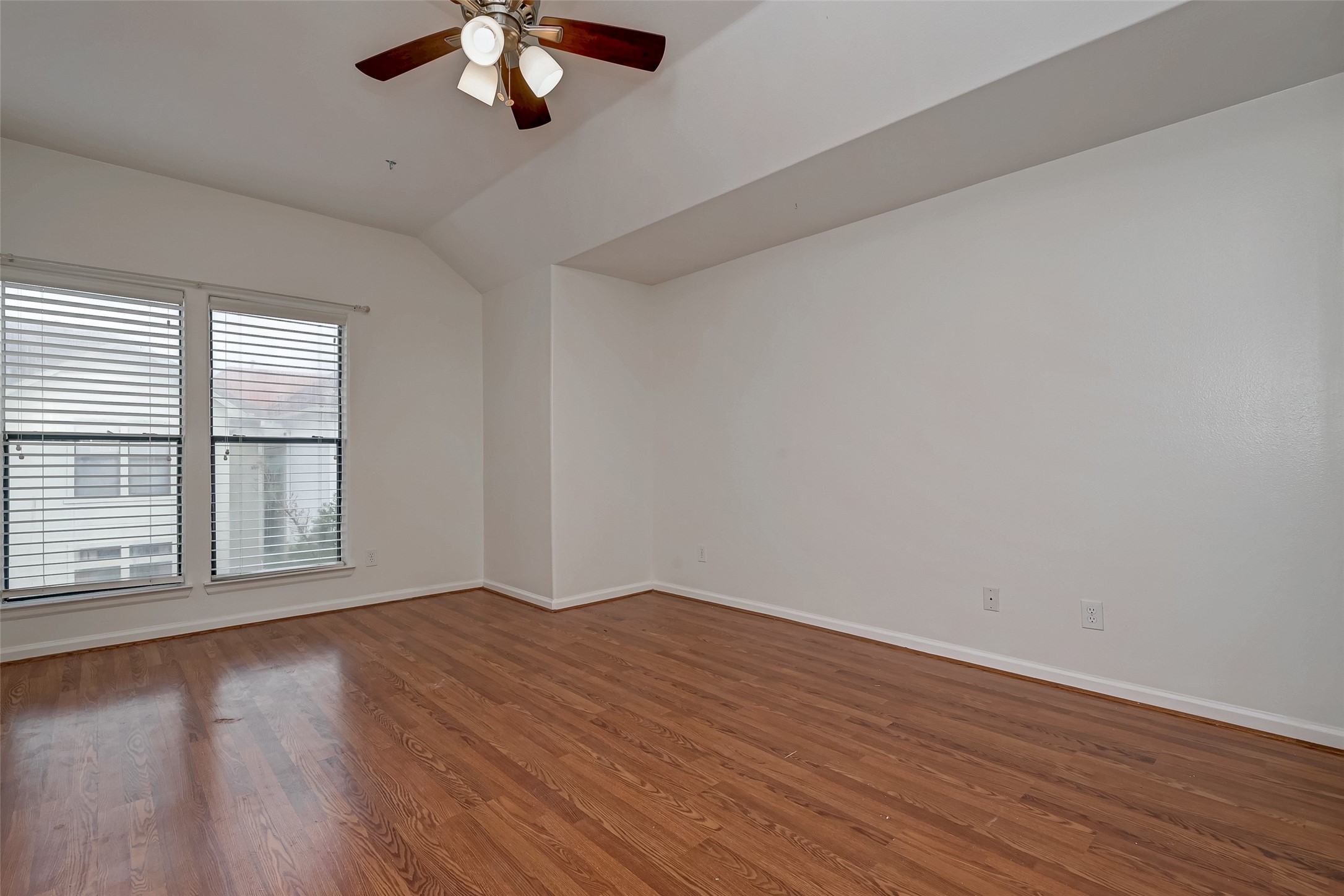 5410 Rose Street Houston, TX 77007 - Photo 37 of 41 a view of an empty room with wooden floor and a window