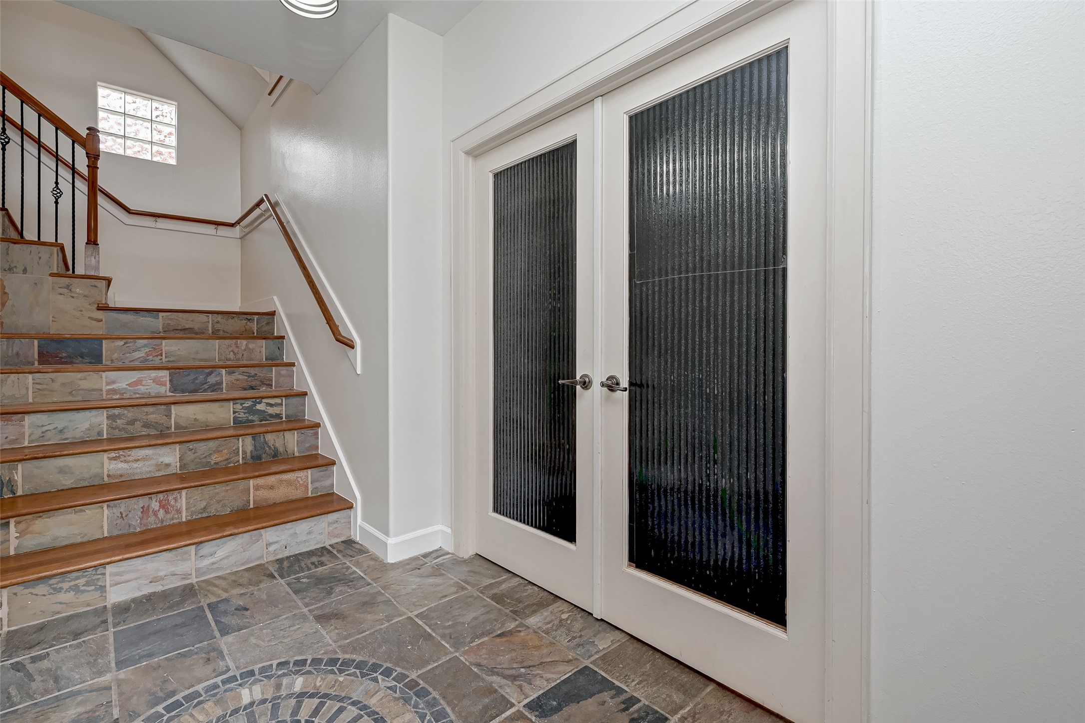 5410 Rose Street Houston, TX 77007 - Photo 6 of 41 a view of entryway with wooden floor and stairs