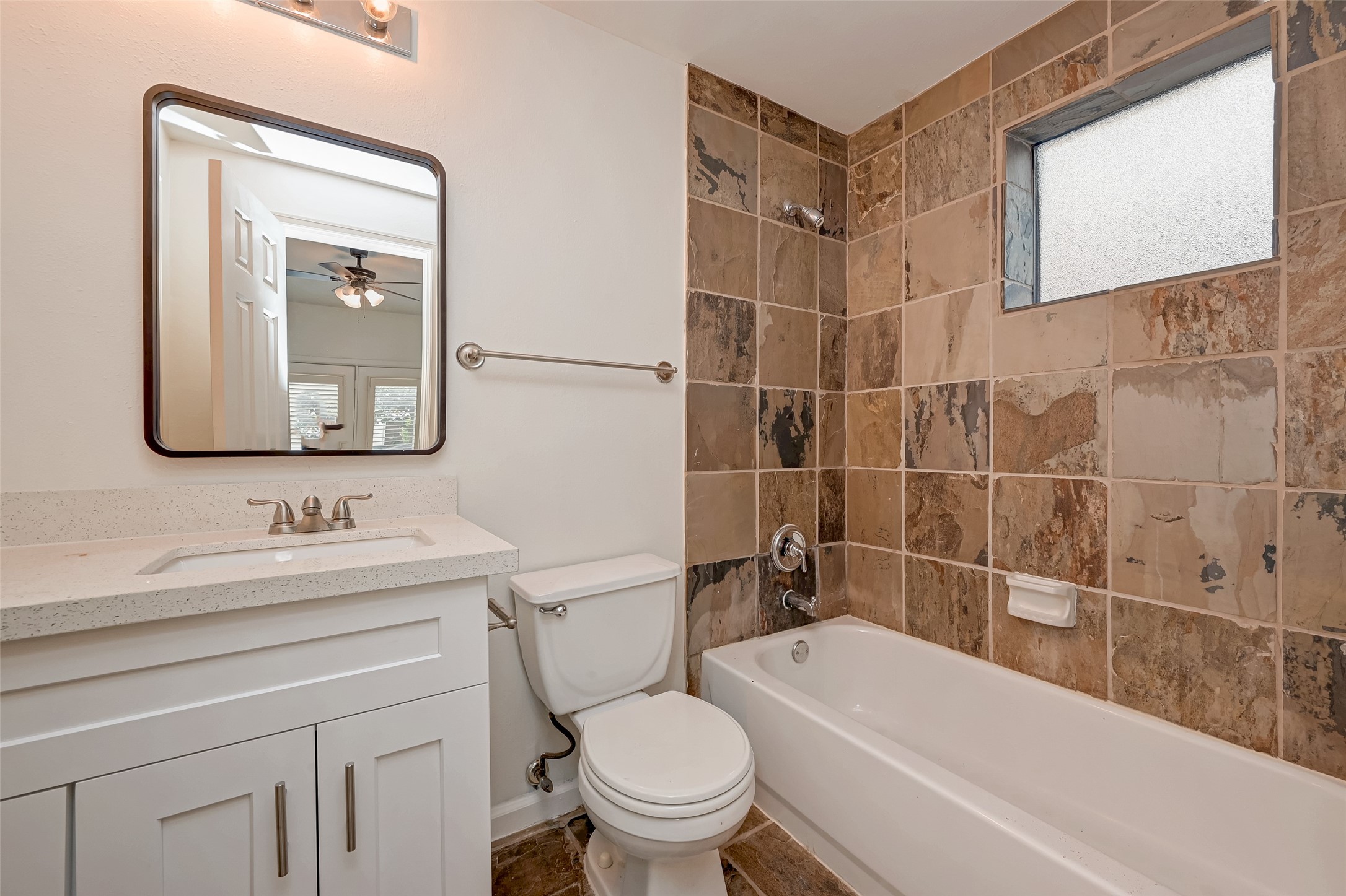 5410 Rose Street Houston, TX 77007 - Photo 10 of 41 a bathroom with a sink a toilet and shower