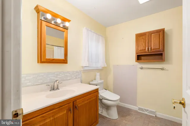 a front view of a house with barbeque