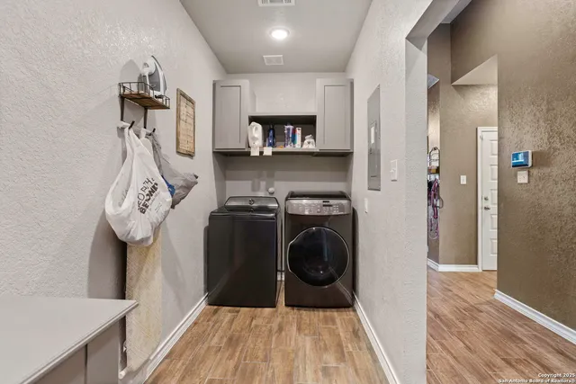 a view of a kitchen storage and utility room