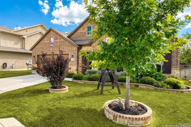 a backyard of a house with lots of green space