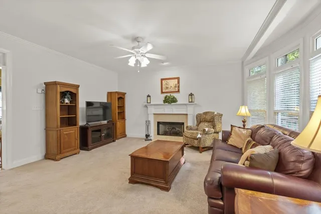 a kitchen with a sink a stove a refrigerator and cabinets