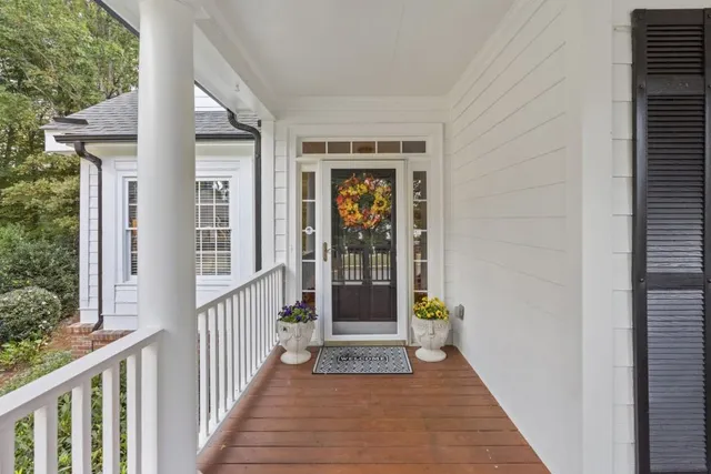 a view of a porch of a house