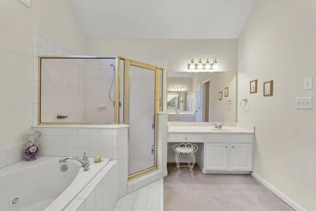 a room with a bed and a chair