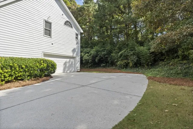 a view of a yard with an outdoor space