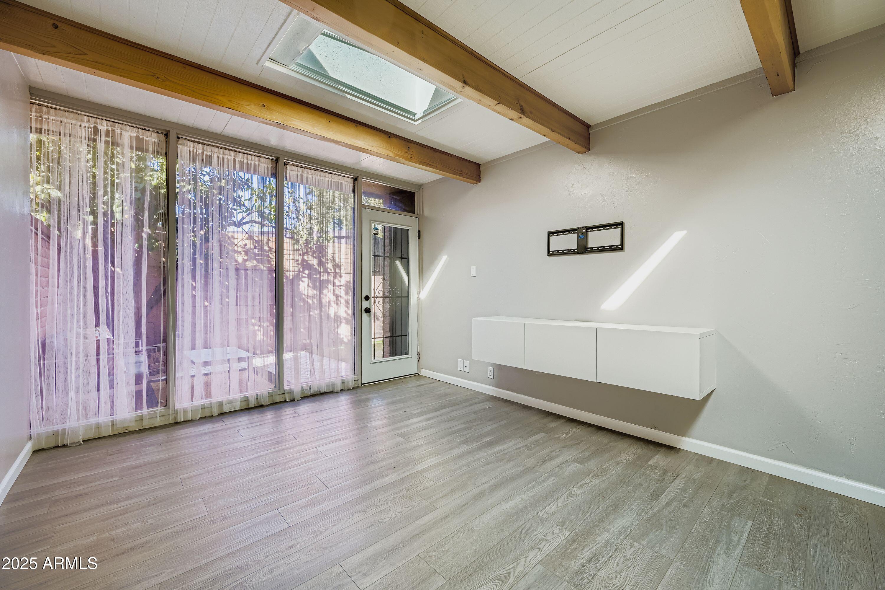 3002 North 32nd Street, Unit 13 Phoenix, AZ 85018 - Photo 16 of 26 Skylight and patio