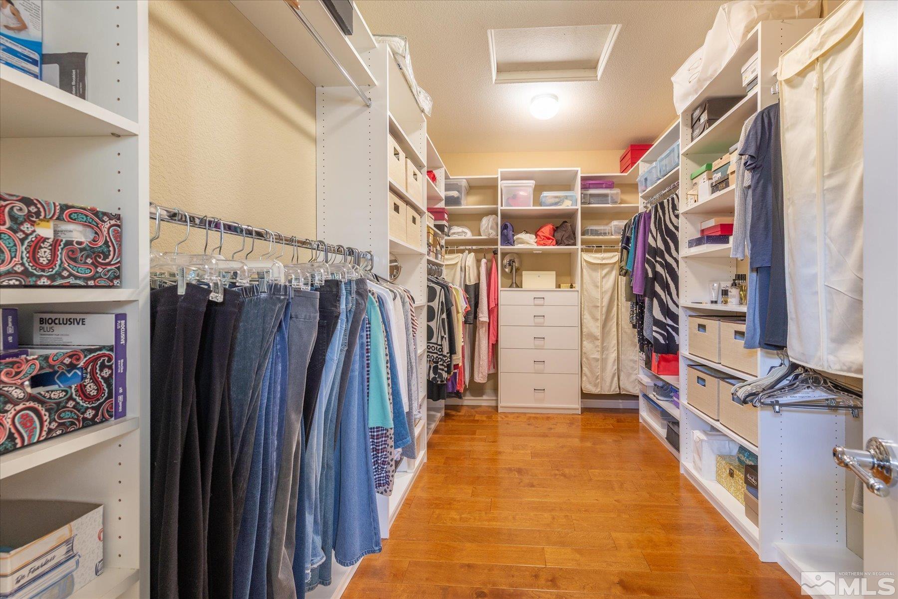1375 Walking Stick Way Reno, NV 89523 - Photo 20 of 39 a view of walk in closet with clothes and shoes