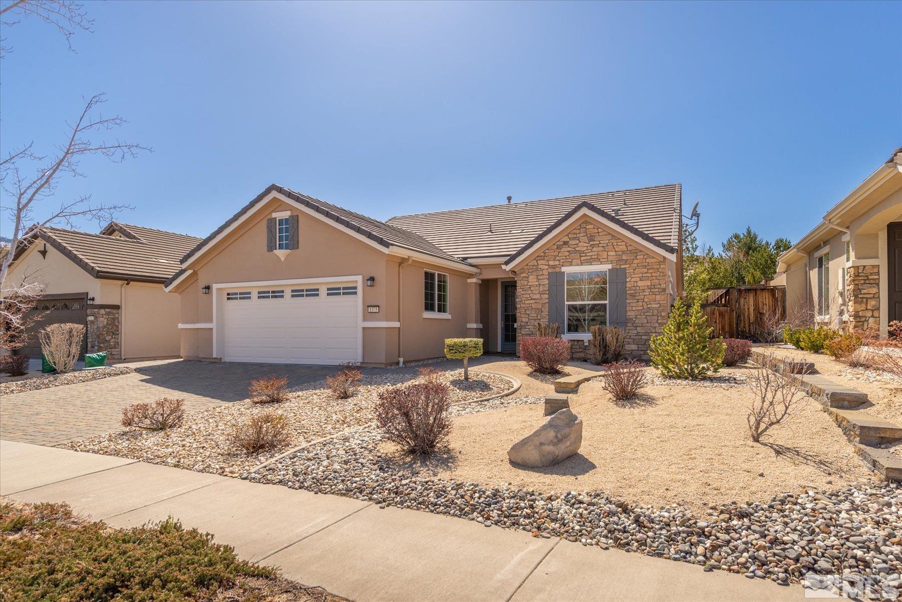 1375 Walking Stick Way Reno, NV 89523 - Photo 2 of 39 a front view of a house with a yard