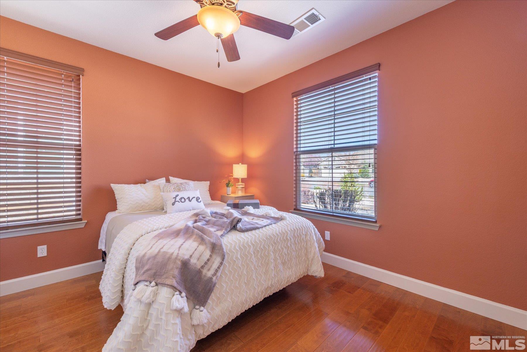 1375 Walking Stick Way Reno, NV 89523 - Photo 21 of 39 a bedroom with a bed and a window