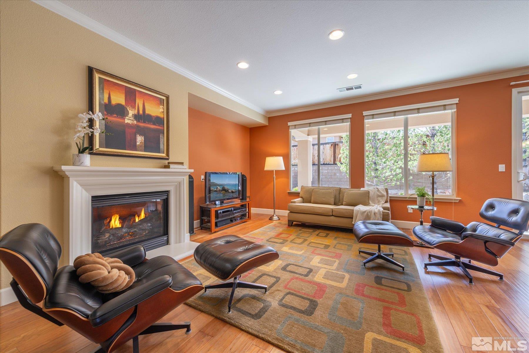 1375 Walking Stick Way Reno, NV 89523 - Photo 9 of 39 a living room with furniture fireplace and large windows