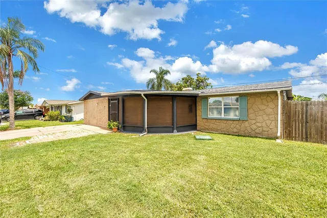 a house view with swimming pool in front of it