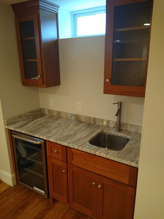 134 Jackson Street Cambridge, MA 02140 - Photo 18 of 22 a kitchen with a sink and cabinets