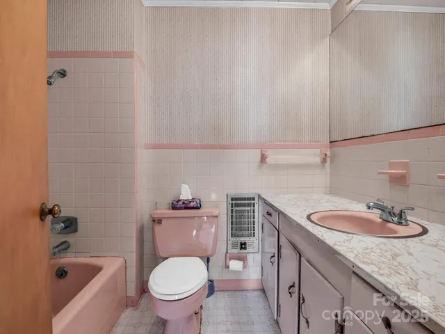 a view of an empty room with stairs