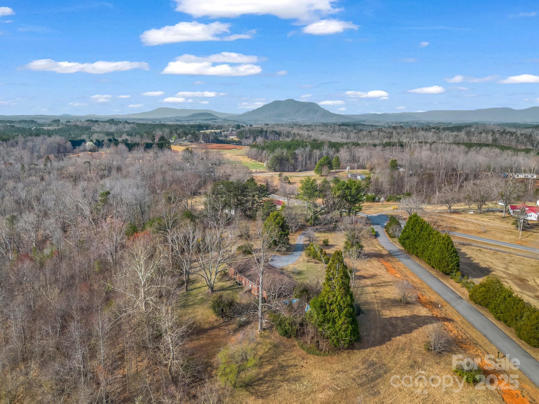 6 Rachel Bell Road Mill Spring, NC 28756 - Photo 34 of 41 a view of a lake with a mountain