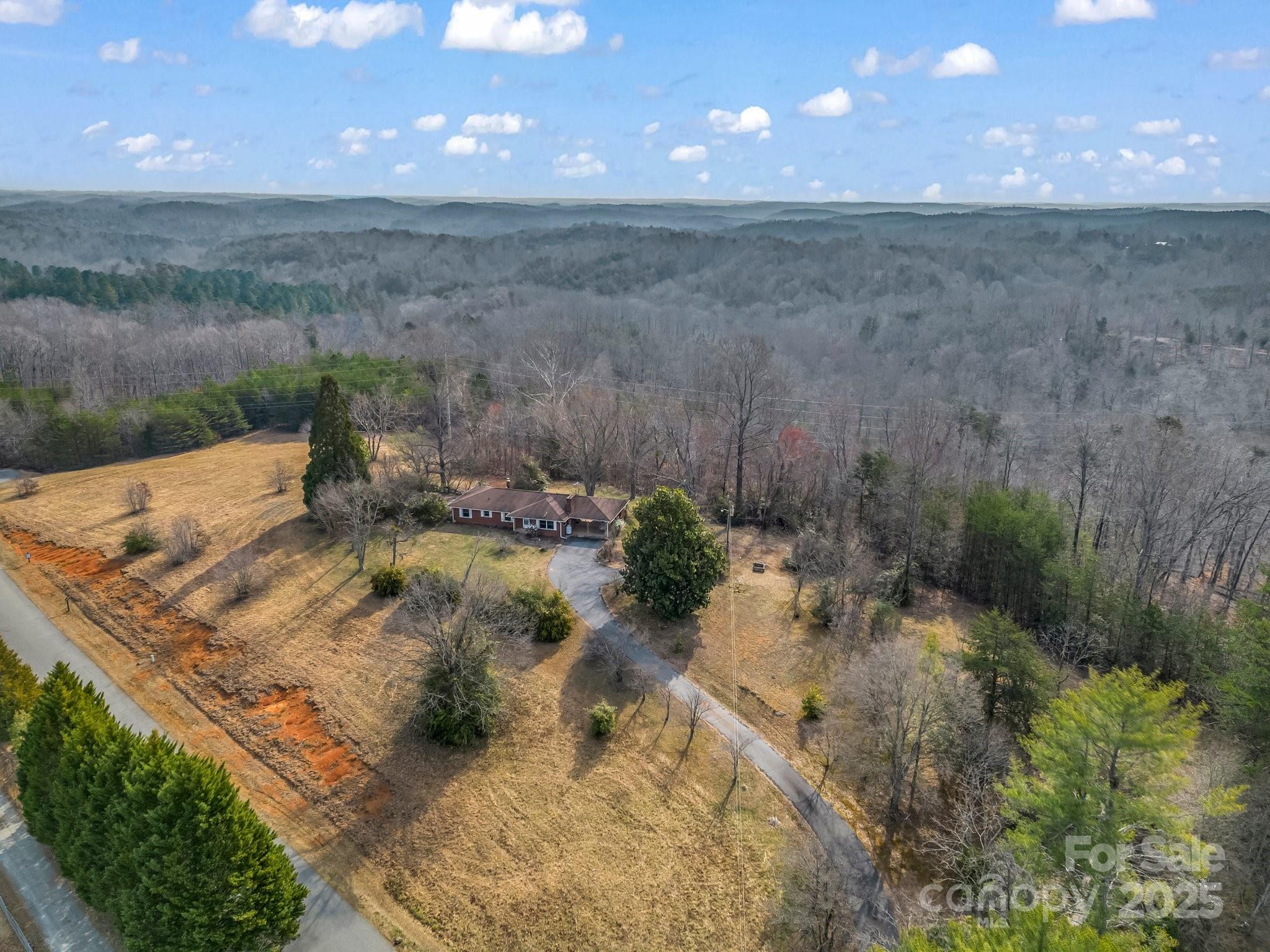 6 Rachel Bell Road Mill Spring, NC 28756 - Photo 36 of 41 a view of a yard with an outdoor space
