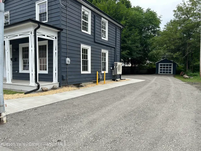 front view of a house with a patio