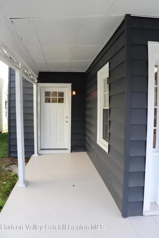 a view of house with an door