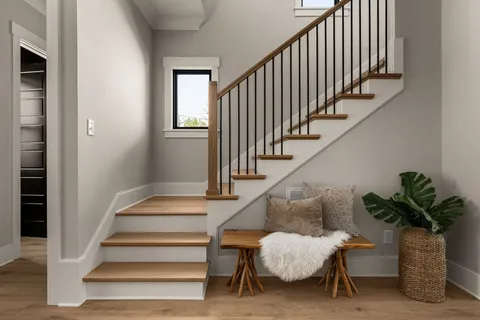 a view of entryway with wooden floor and a potted plant