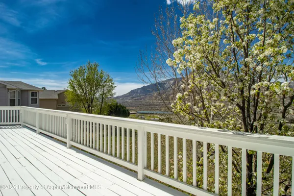 a view of a wooden fence