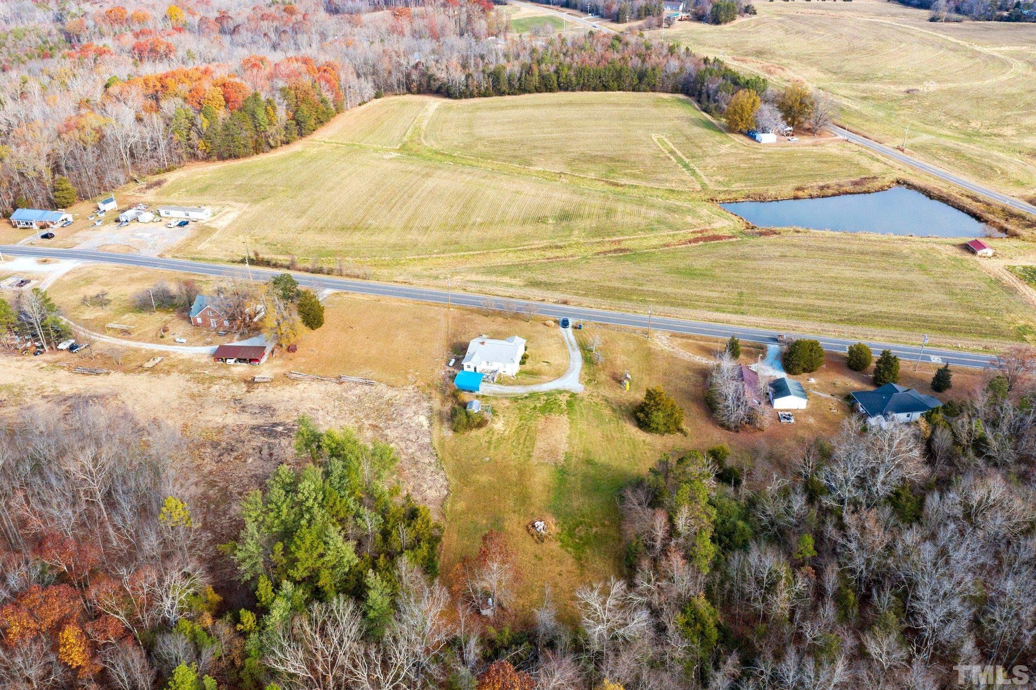 4966 Oxford Road Roxboro, NC 27574 - Photo 1 of 6 a view of swimming pool and mountain view
