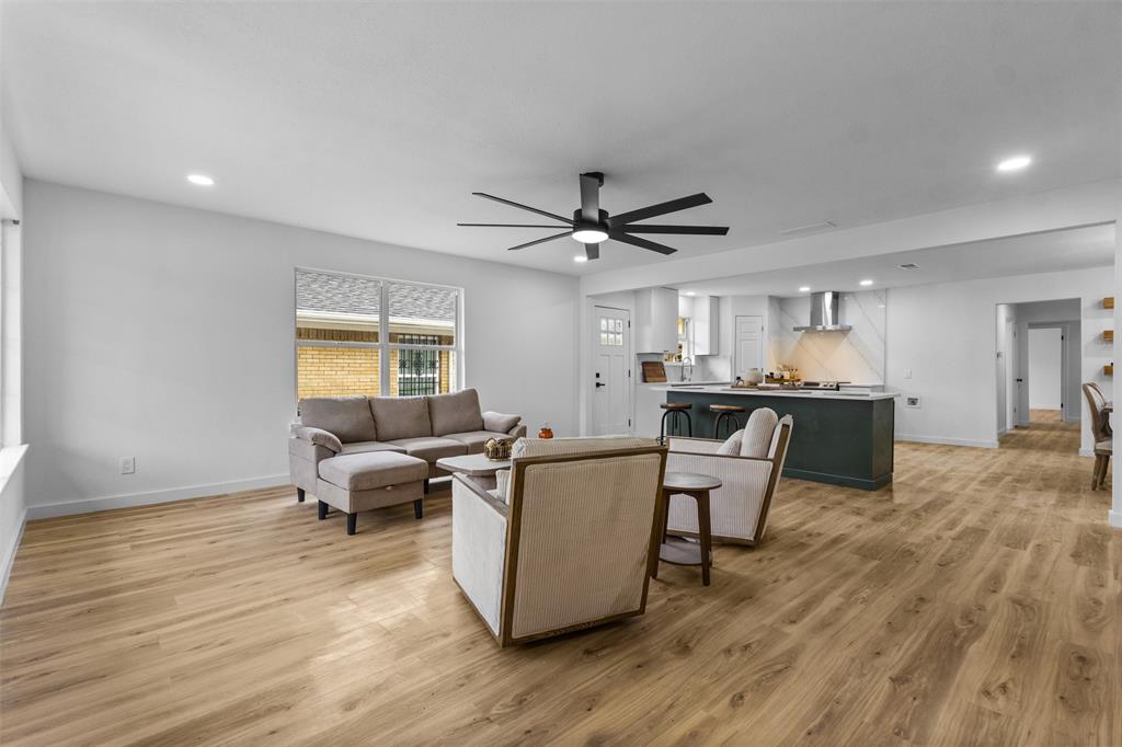 1917 South Vernon Avenue Dallas, TX 75224 - Photo 6 of 28 Open-concept living space featuring wood-finish flooring, recessed lighting, and a modern ceiling fan