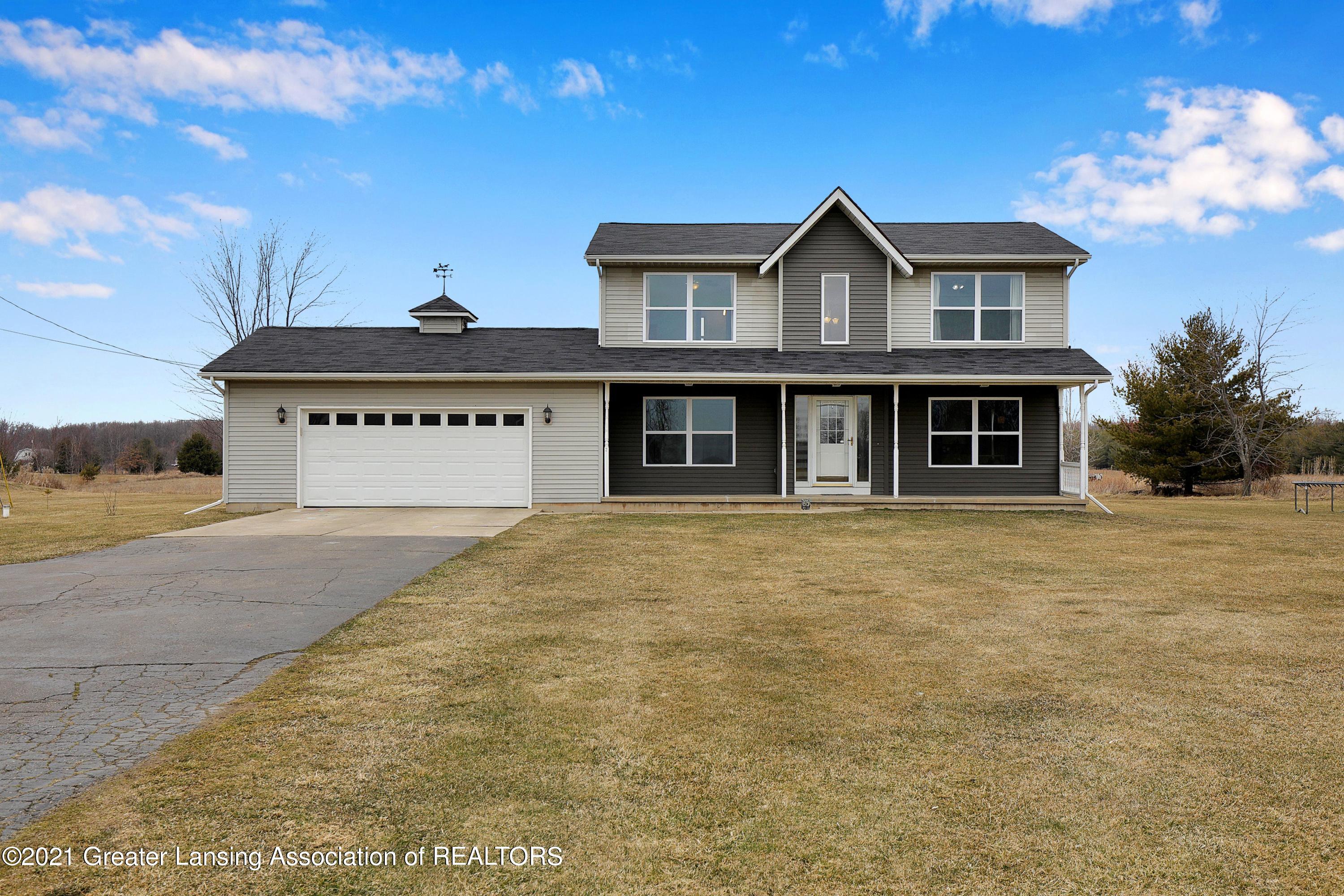 6510 West Howe Road Dewitt, MI 48820 - Photo 1 of 41 Front