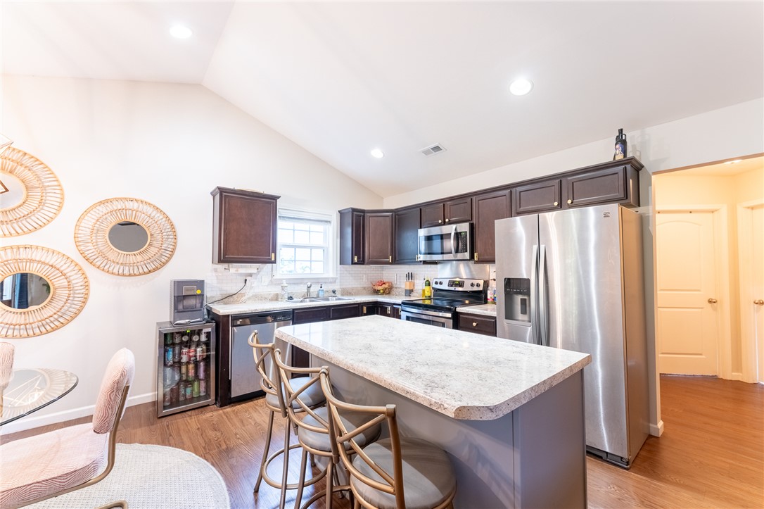 1012 Whirlaway Circle Anderson, SC 29621 - Photo 7 of 25 Culinary delights await in this bright kitchen with vaulted ceilings and ample counter space.
