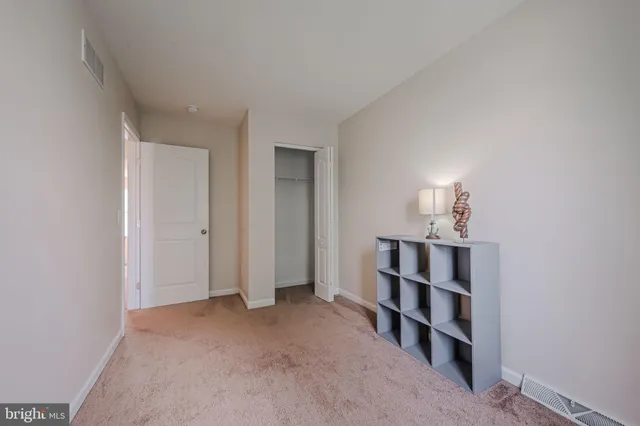 a view of a livingroom with furniture