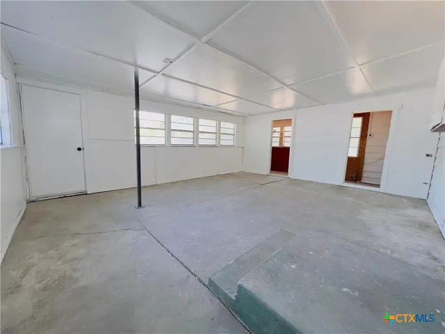a view of a room with window and fireplace