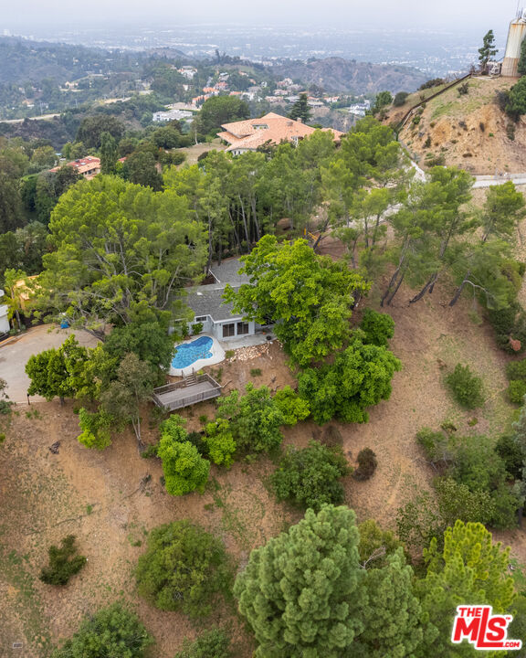 2526 Briarcrest Road Beverly Hills, CA 90210 - Photo 14 of 15 an aerial view of a houses with a yard