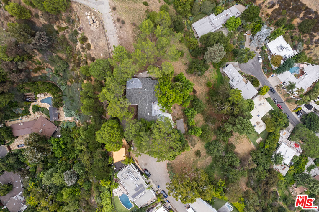 2526 Briarcrest Road Beverly Hills, CA 90210 - Photo 15 of 15 an aerial view of a house with a yard