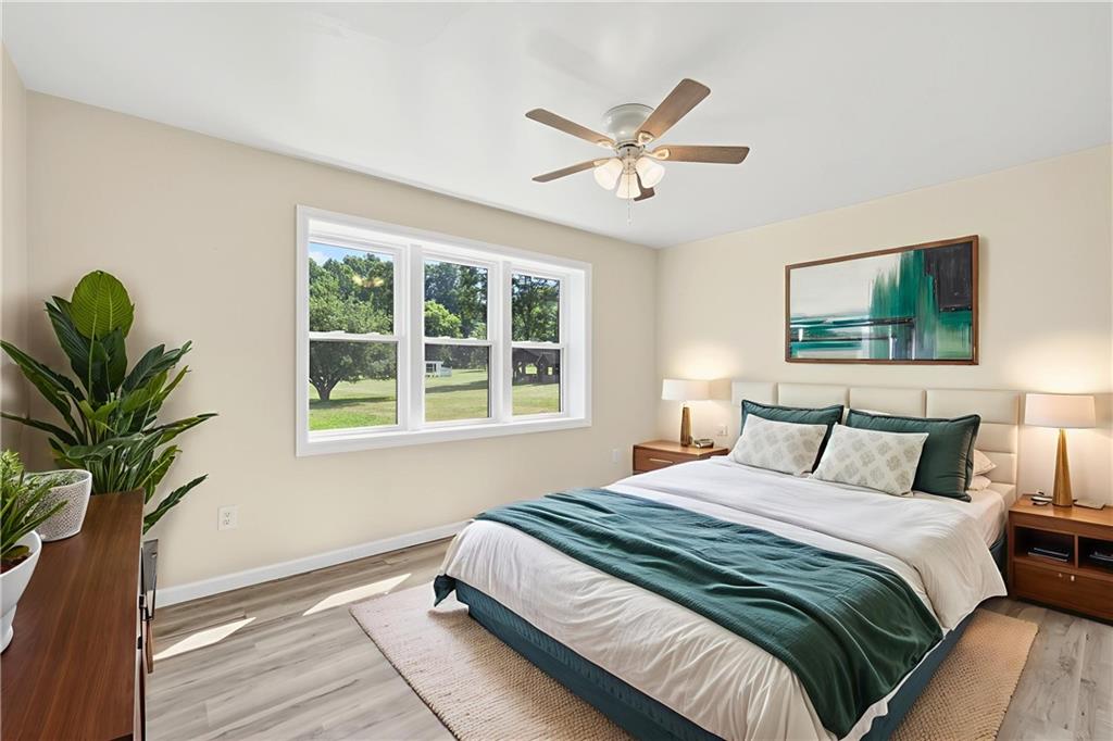 545 Vanderbilt Road Connellsville, PA 15425 - Photo 18 of 49 a bedroom with a large bed and a window