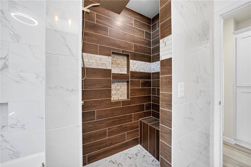 545 Vanderbilt Road Connellsville, PA 15425 - Photo 21 of 49 a bathroom with a glass door shower