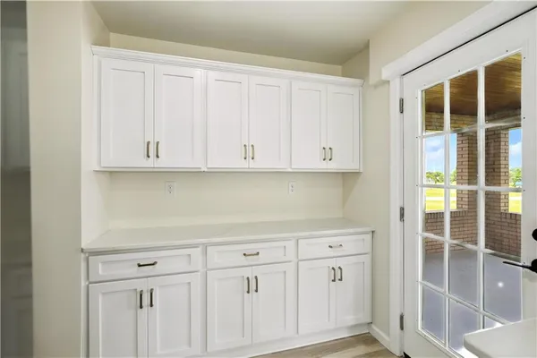 a view of cabinets and window