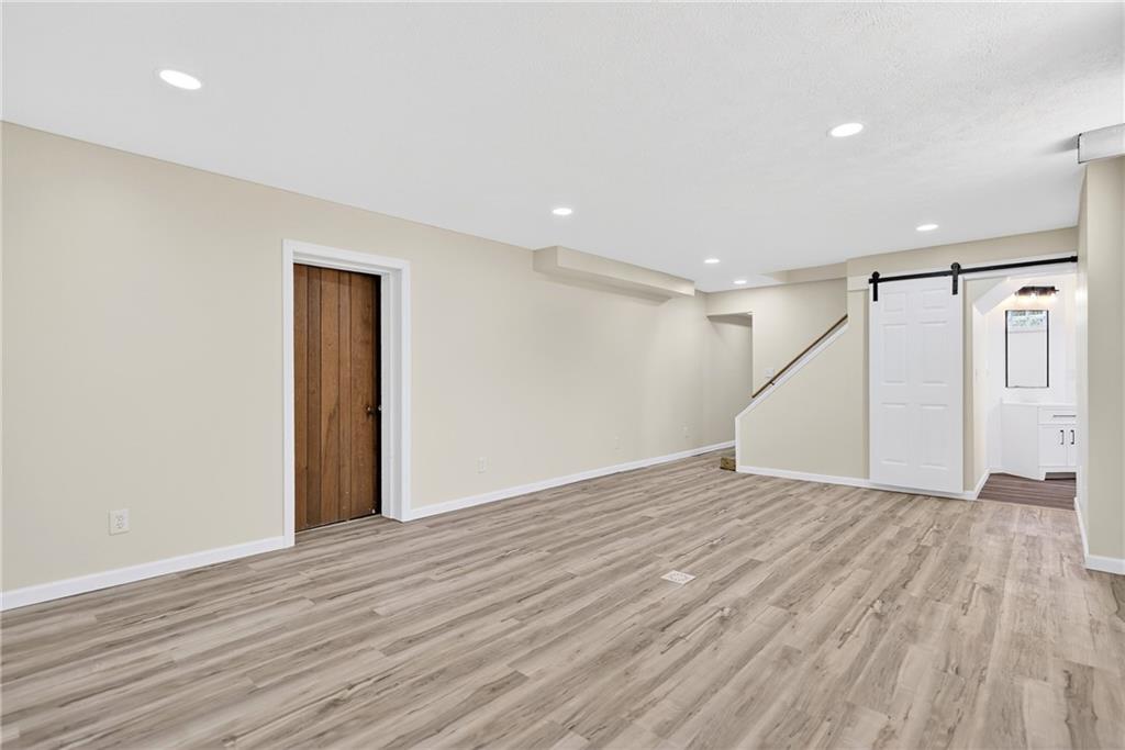 545 Vanderbilt Road Connellsville, PA 15425 - Photo 42 of 49 a view of an empty room with wooden floor